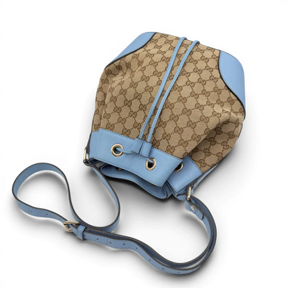 https://cdn.shopify.com/s/files/1/0564/9376/8855/files/Gucci_Umhangetasche_Bucket_monogram_beige_10.webp?v=1782385132