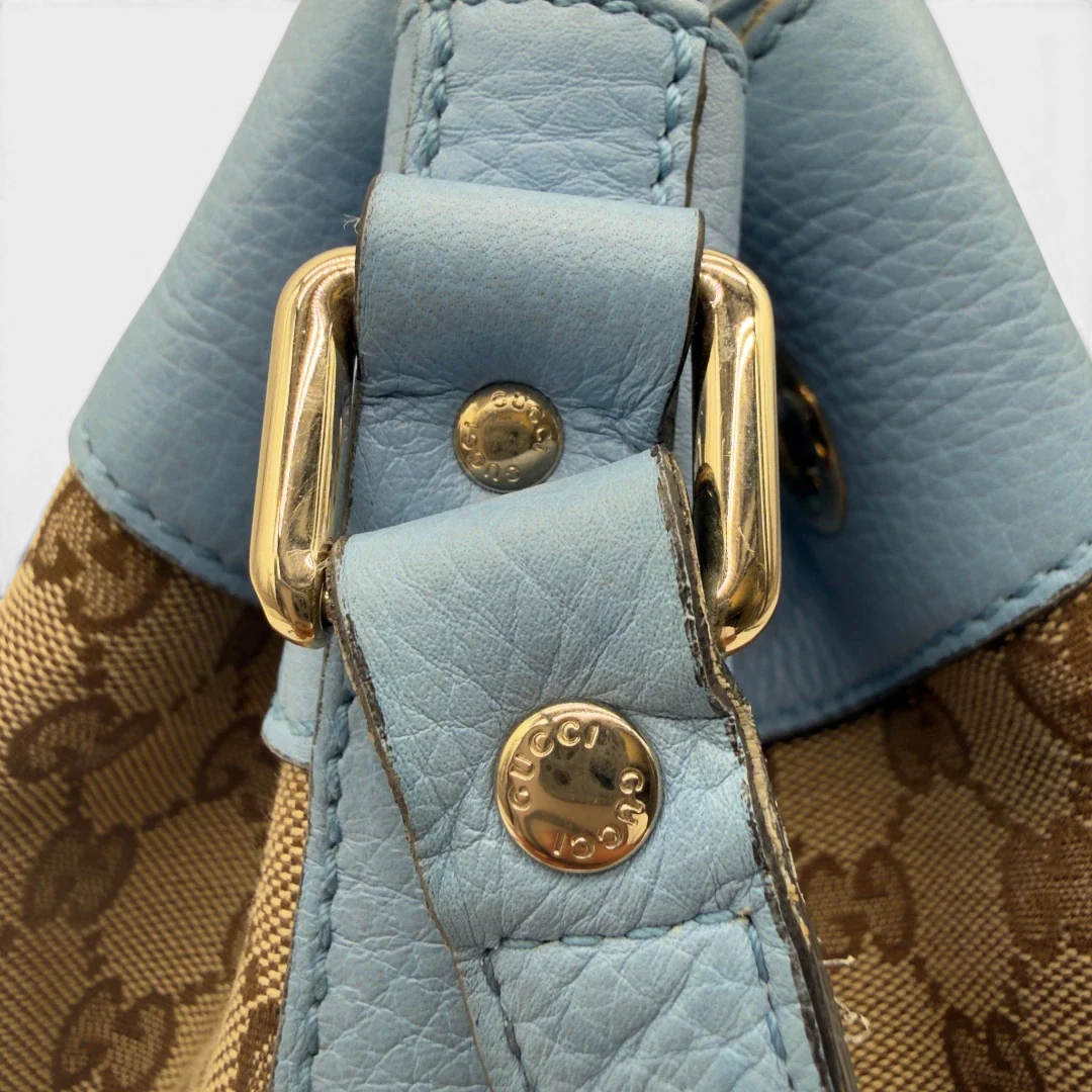 https://cdn.shopify.com/s/files/1/0564/9376/8855/files/Gucci_Umhangetasche_Bucket_monogram_beige_12.webp?v=1782385132