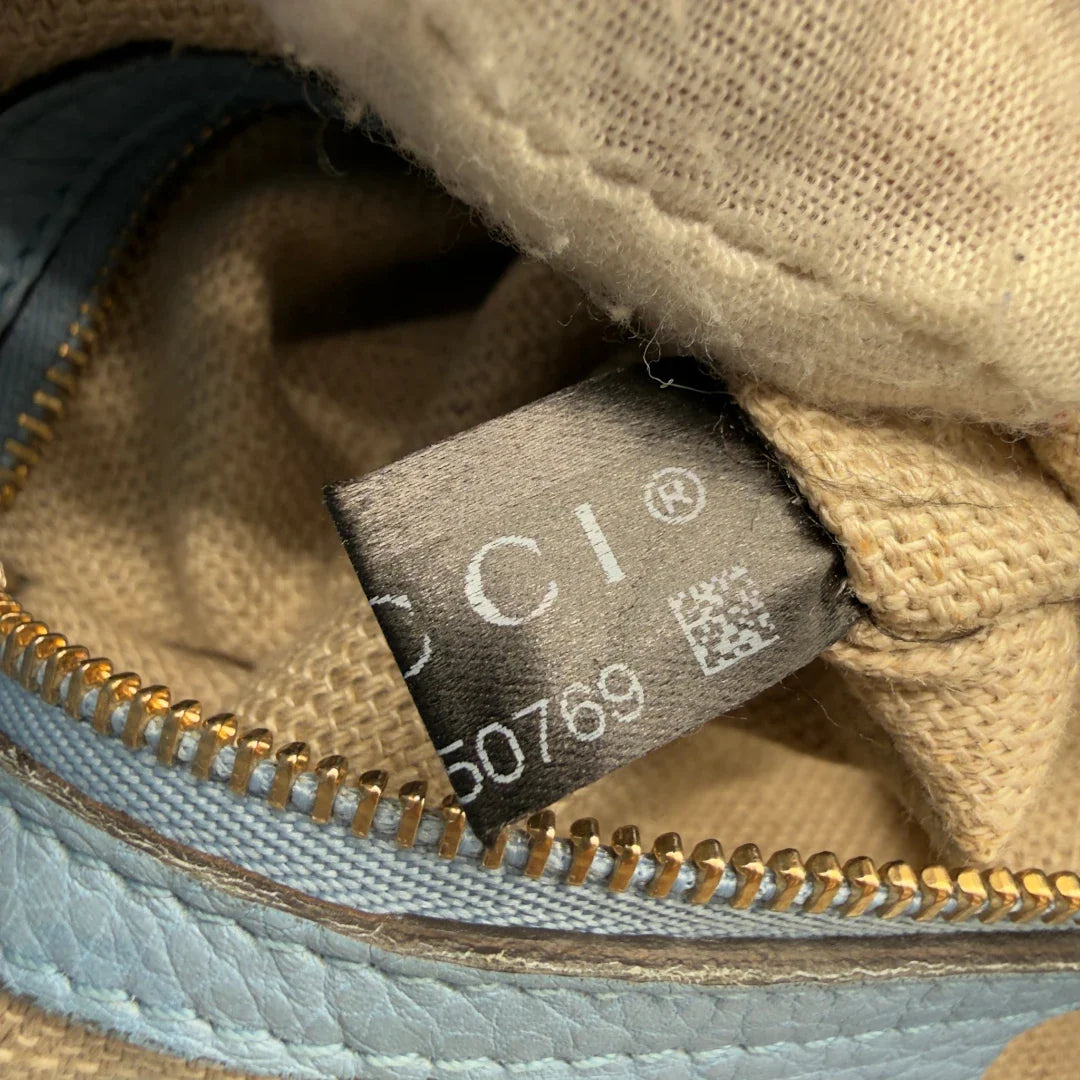 https://cdn.shopify.com/s/files/1/0564/9376/8855/files/Gucci_Umhangetasche_Bucket_monogram_beige_17.webp?v=1782385133
