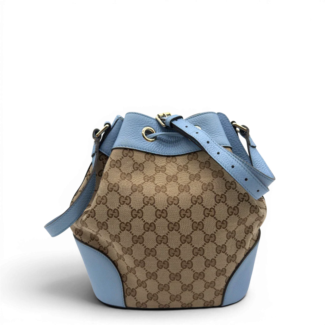 https://cdn.shopify.com/s/files/1/0564/9376/8855/files/Gucci_Umhangetasche_Bucket_monogram_beige_2.webp?v=1782385132