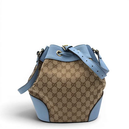 https://cdn.shopify.com/s/files/1/0564/9376/8855/files/Gucci_Umhangetasche_Bucket_monogram_beige_2.webp?v=1782385132