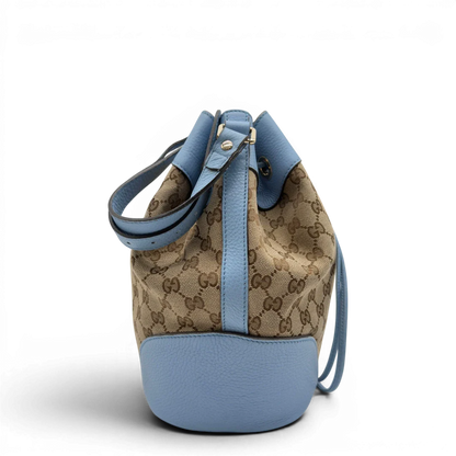 https://cdn.shopify.com/s/files/1/0564/9376/8855/files/Gucci_Umhangetasche_Bucket_monogram_beige_4.webp?v=1782385133