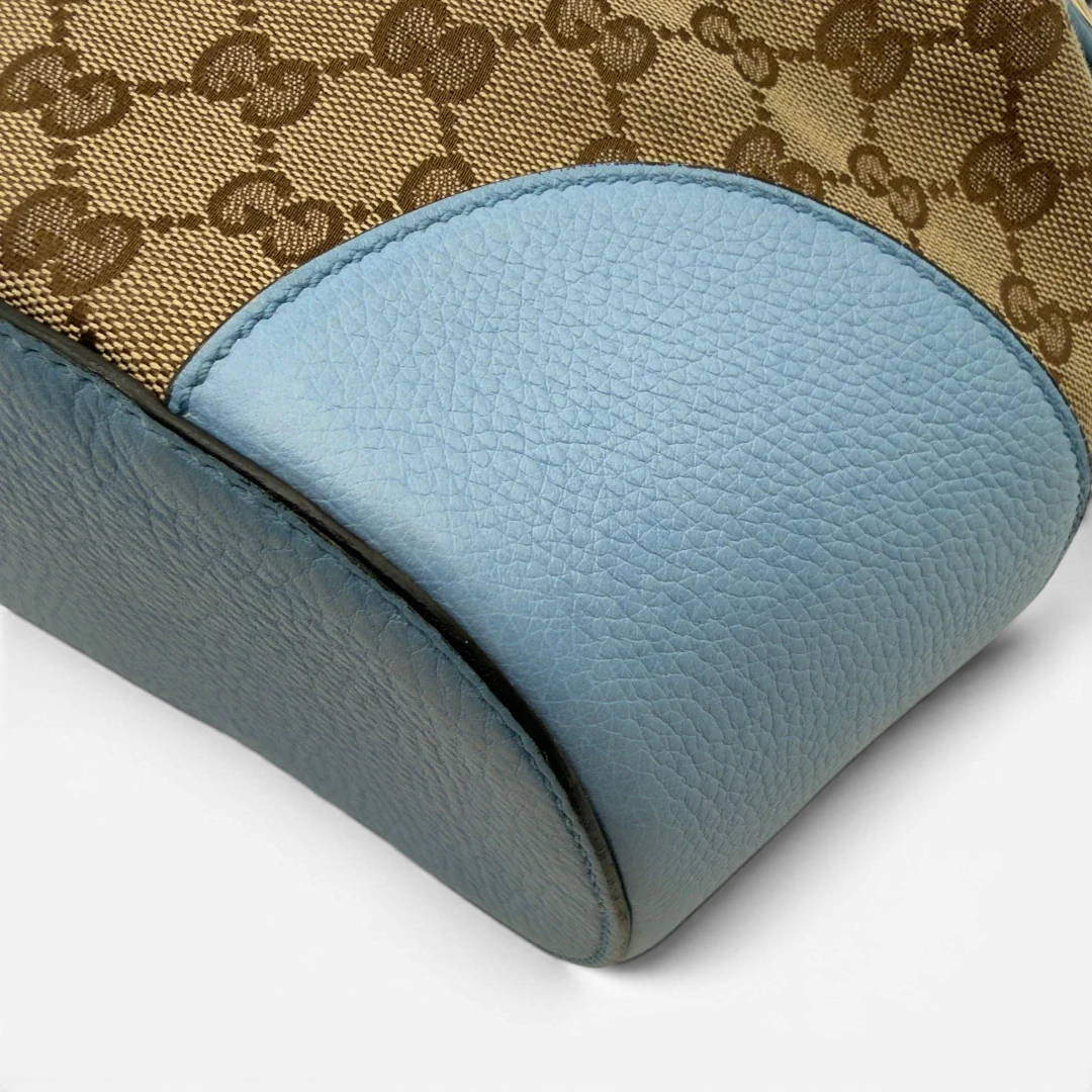 https://cdn.shopify.com/s/files/1/0564/9376/8855/files/Gucci_Umhangetasche_Bucket_monogram_beige_6.webp?v=1782385133