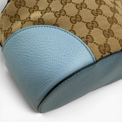 https://cdn.shopify.com/s/files/1/0564/9376/8855/files/Gucci_Umhangetasche_Bucket_monogram_beige_7.webp?v=1782385133