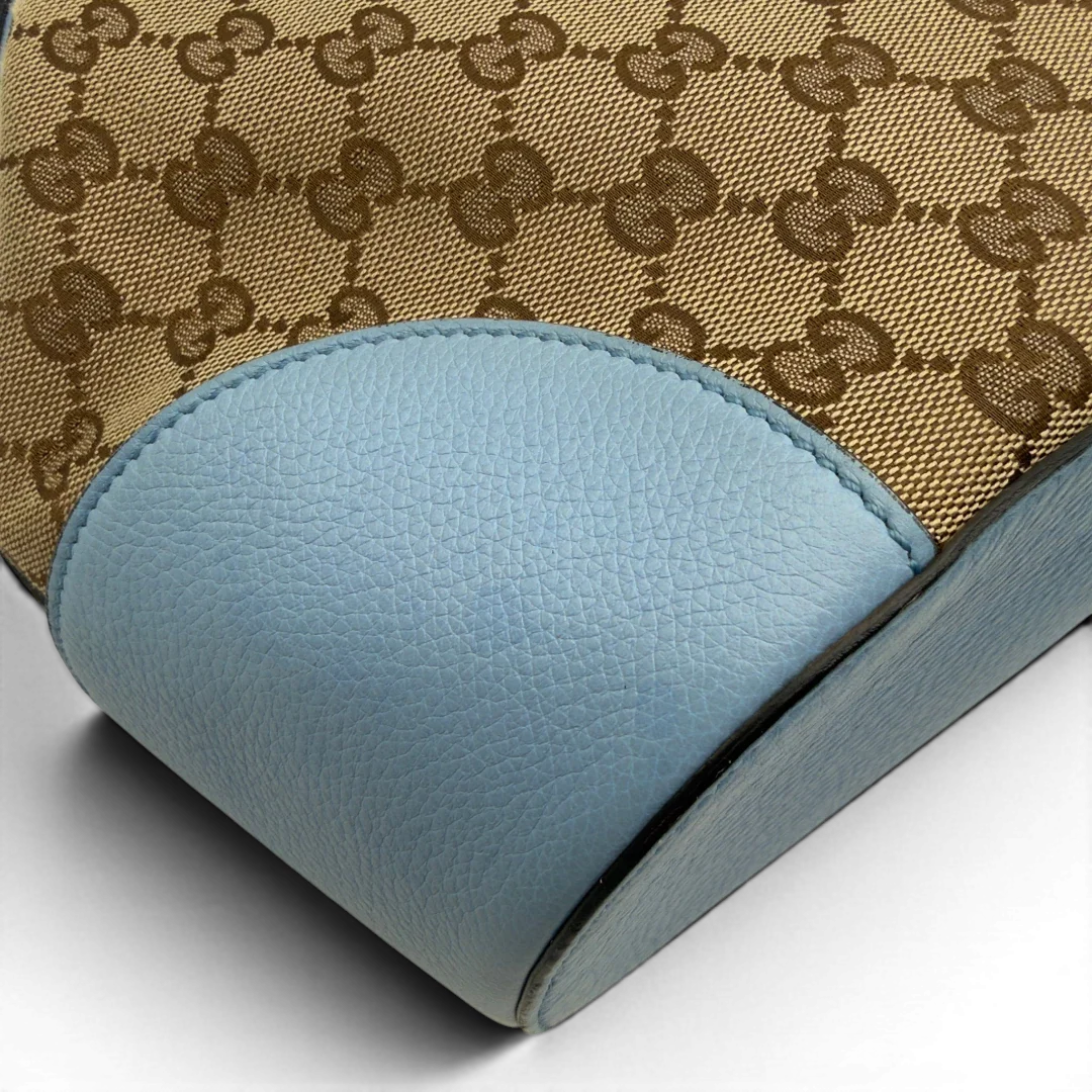 https://cdn.shopify.com/s/files/1/0564/9376/8855/files/Gucci_Umhangetasche_Bucket_monogram_beige_9.webp?v=1782385133