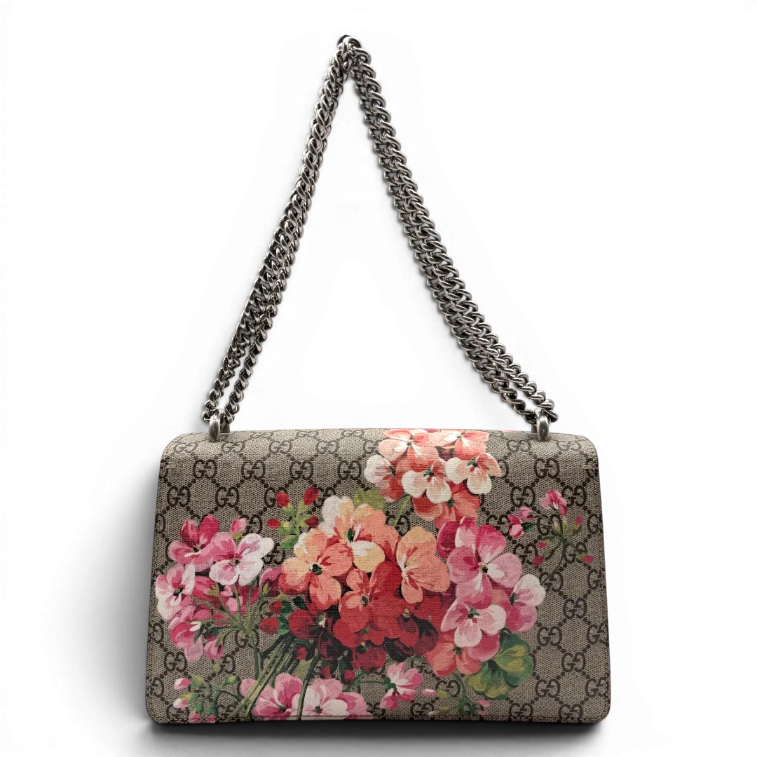 https://cdn.shopify.com/s/files/1/0564/9376/8855/files/Gucci_Umhangetasche_Dionysus_Floral_medium_monogram_beige_vintage_GG7139.webp?v=1779893697