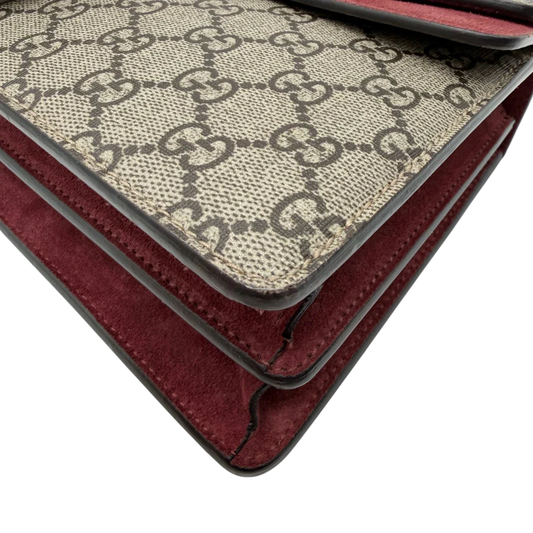 https://cdn.shopify.com/s/files/1/0564/9376/8855/files/Gucci_Umhangetasche_Dionysus_Floral_medium_monogram_beige_vintage_GG7141.webp?v=1779893697