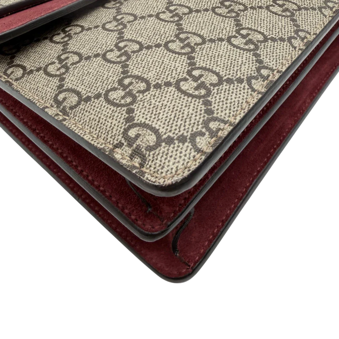 https://cdn.shopify.com/s/files/1/0564/9376/8855/files/Gucci_Umhangetasche_Dionysus_Floral_medium_monogram_beige_vintage_GG7142.webp?v=1779893697