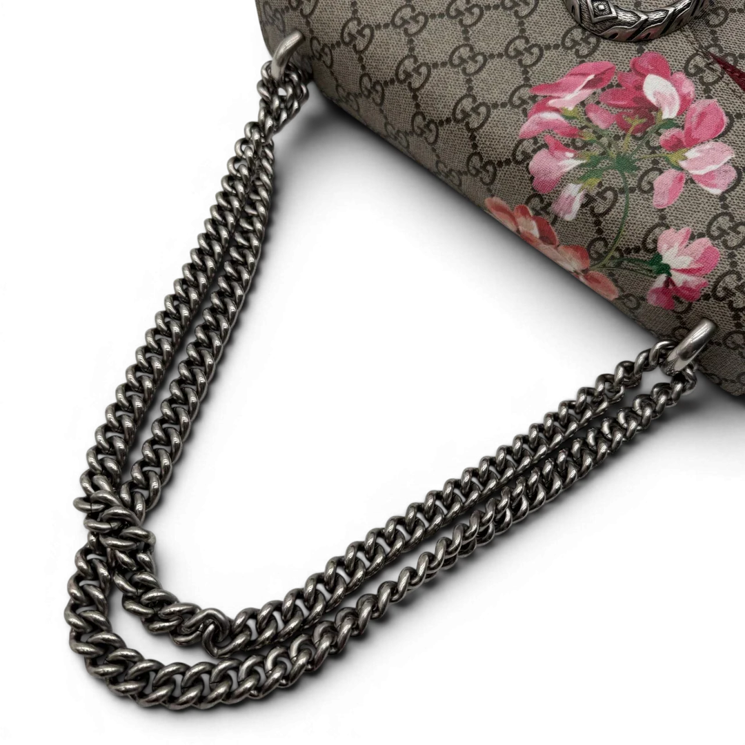 https://cdn.shopify.com/s/files/1/0564/9376/8855/files/Gucci_Umhangetasche_Dionysus_Floral_medium_monogram_beige_vintage_GG7145.webp?v=1779893697