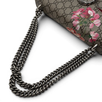 https://cdn.shopify.com/s/files/1/0564/9376/8855/files/Gucci_Umhangetasche_Dionysus_Floral_medium_monogram_beige_vintage_GG7145.webp?v=1779893697