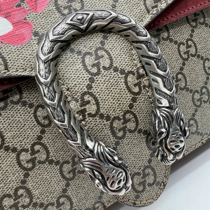 https://cdn.shopify.com/s/files/1/0564/9376/8855/files/Gucci_Umhangetasche_Dionysus_Floral_medium_monogram_beige_vintage_GG7146.webp?v=1779893697