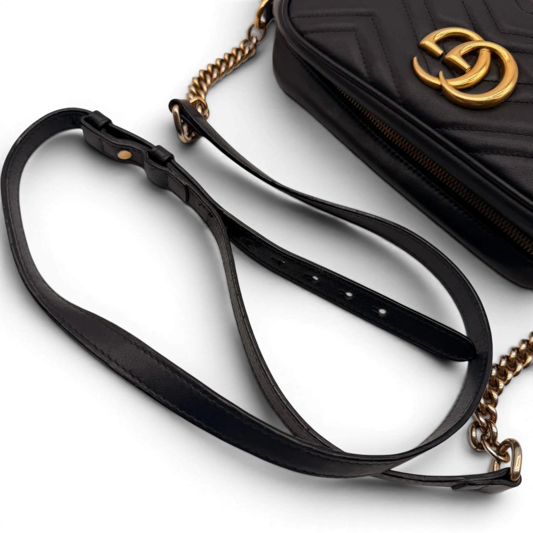 https://cdn.shopify.com/s/files/1/0564/9376/8855/files/Gucci_Umhangetasche_Marmont_Small_GG_monogram_schwarz_vintage_GG7170.webp?v=1779895171