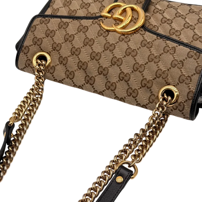 https://cdn.shopify.com/s/files/1/0564/9376/8855/files/Gucci_Umhangetasche_Marmont_medium_GG_monogram_beige_11.webp?v=1784802026