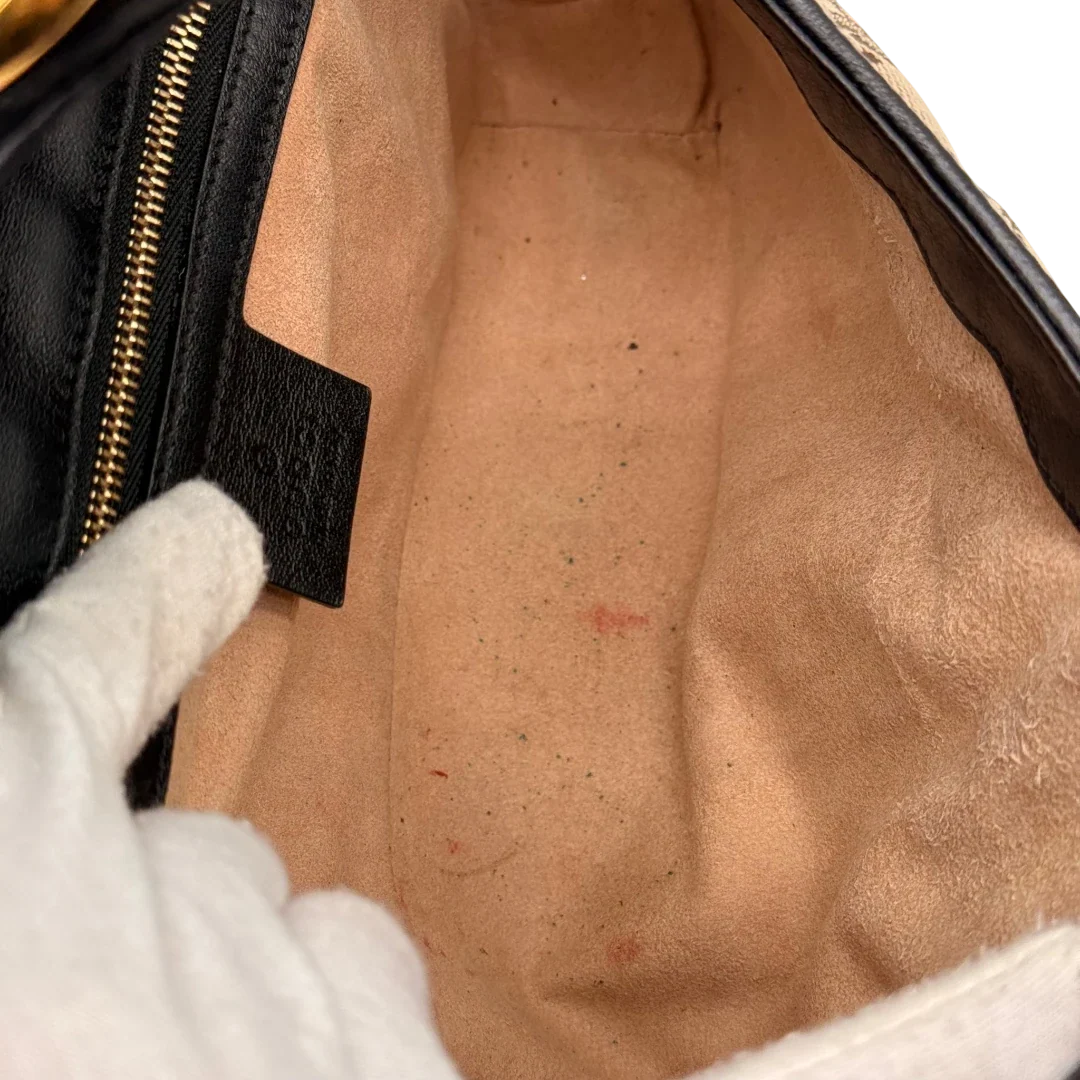 https://cdn.shopify.com/s/files/1/0564/9376/8855/files/Gucci_Umhangetasche_Marmont_medium_GG_monogram_beige_22.webp?v=1784802026