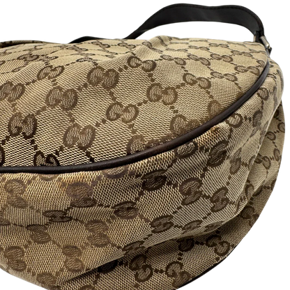 https://cdn.shopify.com/s/files/1/0564/9376/8855/files/Gucci_Umhangetasche_Sukey_One_monogram_beige_vintage_GG2135.webp?v=1779963479