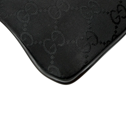 https://cdn.shopify.com/s/files/1/0564/9376/8855/files/Gucci_Umhangetasche_aus_Nylon_monogram_schwarz_9.webp?v=1782312847