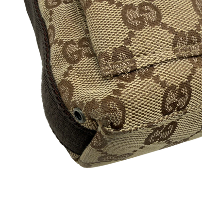 https://cdn.shopify.com/s/files/1/0564/9376/8855/files/Gucci_Umhangetasche_small_monogram_beige_vintage_GG8210.webp?v=1780409096