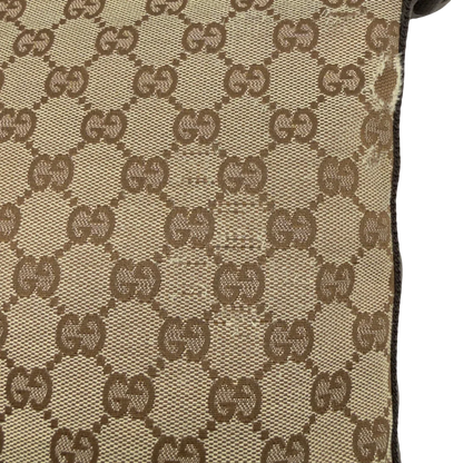 https://cdn.shopify.com/s/files/1/0564/9376/8855/files/Gucci_Umhangetasche_small_monogram_beige_vintage_GG8215.webp?v=1780409098