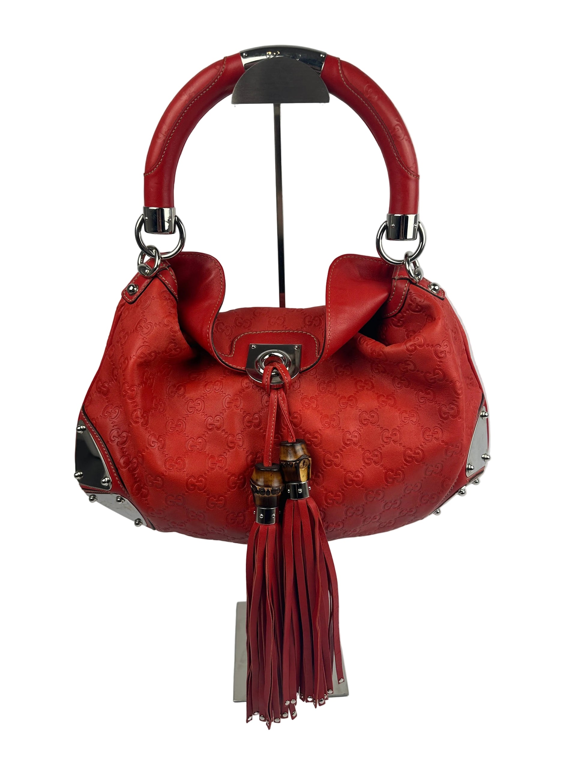 https://cdn.shopify.com/s/files/1/0900/2729/5066/files/Gucci_indy_bag_red_monogram_2007.jpg?v=1776362149