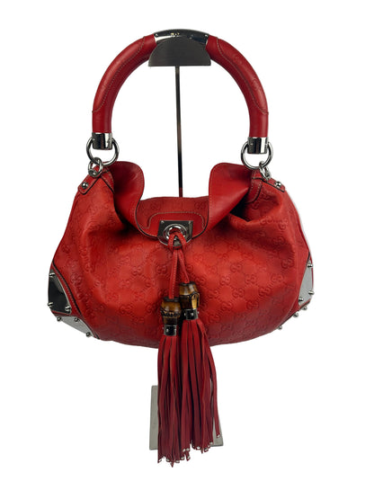 https://cdn.shopify.com/s/files/1/0900/2729/5066/files/Gucci_indy_bag_red_monogram_2007.jpg?v=1776362149