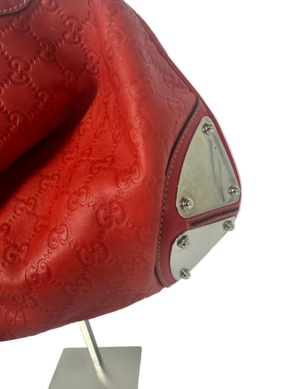 https://cdn.shopify.com/s/files/1/0900/2729/5066/files/Gucci_indy_bag_red_monogram_2007_Detail.jpg?v=1776362149