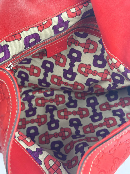 https://cdn.shopify.com/s/files/1/0900/2729/5066/files/Gucci_indy_bag_red_monogram_2007_Inside.jpg?v=1776362149