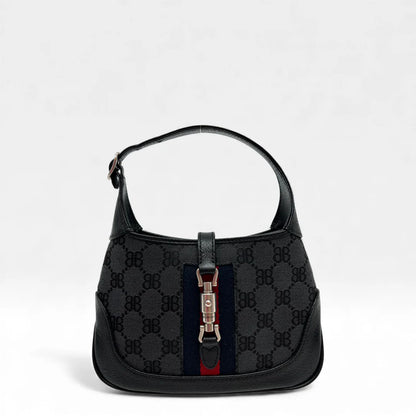 https://cdn.shopify.com/s/files/1/0564/9376/8855/files/Gucci_x_Balenciaga_Handtasche_Jackie_1961_mini_monogram_schwarz_vintage_GG_black_edition_handbag_9940.webp?v=1765456678