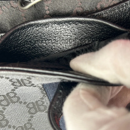 https://cdn.shopify.com/s/files/1/0564/9376/8855/files/Gucci_x_Balenciaga_Handtasche_Jackie_1961_mini_monogram_schwarz_vintage_GG_black_edition_handbag_9967.webp?v=1765456678