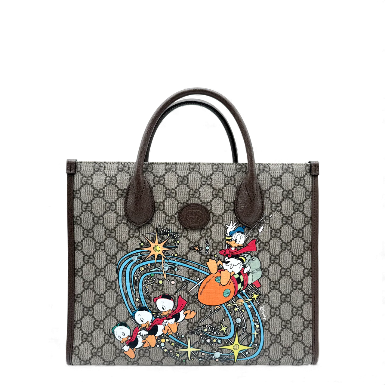 https://cdn.shopify.com/s/files/1/0564/9376/8855/files/Gucci_x_Disney_Handtasche___Tote_Bag_Donald_Duck_Ebony_GG_Supreme_monogram_beige___braun4301.webp?v=1764850473