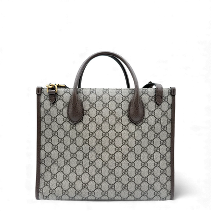 https://cdn.shopify.com/s/files/1/0564/9376/8855/files/Gucci_x_Disney_Handtasche___Tote_Bag_Donald_Duck_Ebony_GG_Supreme_monogram_beige___braun4303.webp?v=1764850487
