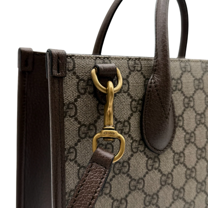 https://cdn.shopify.com/s/files/1/0564/9376/8855/files/Gucci_x_Disney_Handtasche___Tote_Bag_Donald_Duck_Ebony_GG_Supreme_monogram_beige___braun4319.webp?v=1764850487