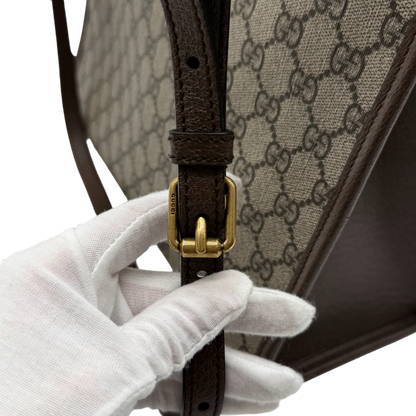 https://cdn.shopify.com/s/files/1/0564/9376/8855/files/Gucci_x_Disney_Handtasche___Tote_Bag_Donald_Duck_Ebony_GG_Supreme_monogram_beige___braun4320.webp?v=1764850487