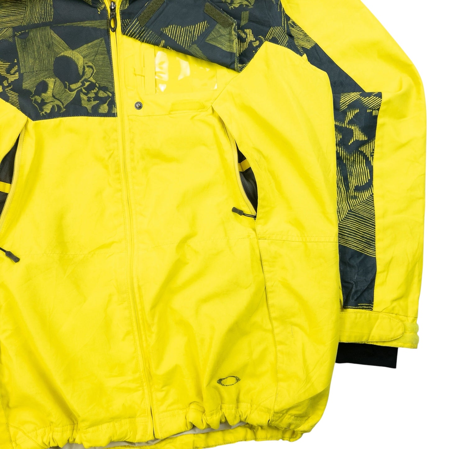 OAKLEY black and yellow zip-up snowboarding jacket bold patterned design on chest and sleeves