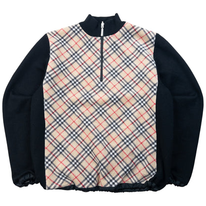 Burberry beige and black reversible jacket featuring classic Nova Check pattern and branded zipper pull.