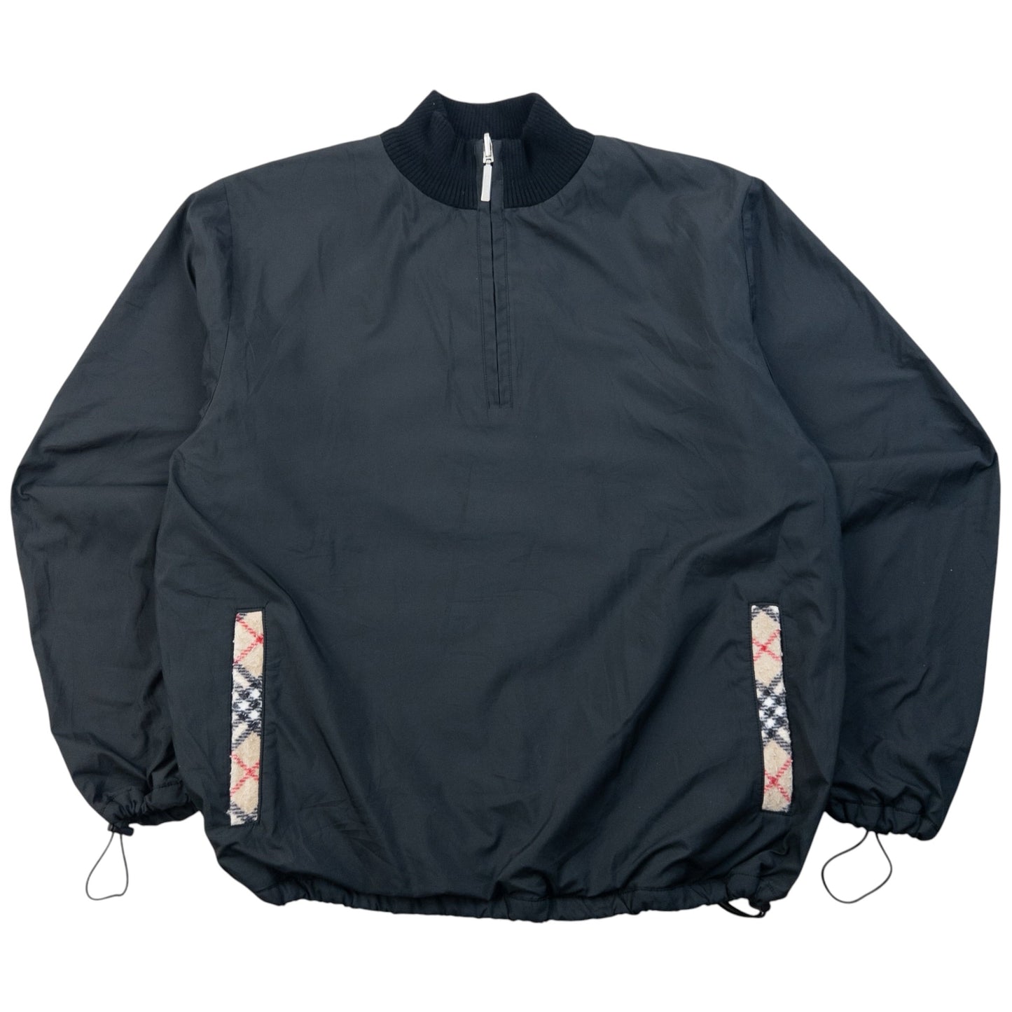 Burberry beige and black reversible jacket featuring classic Nova Check pattern and branded zipper pull.