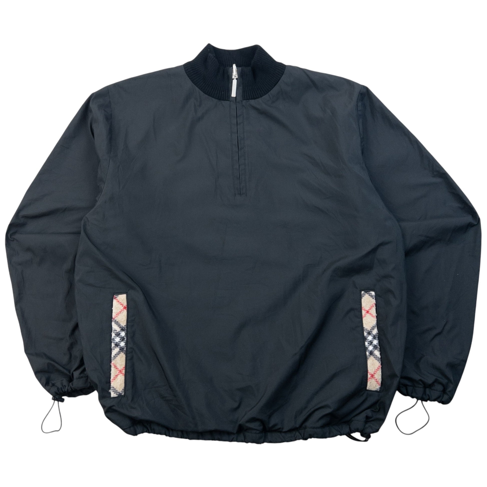 Burberry beige and black reversible jacket featuring classic Nova Check pattern and branded zipper pull.