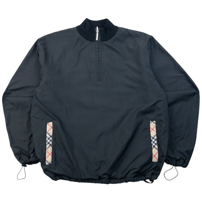 Burberry beige and black reversible jacket featuring classic Nova Check pattern and branded zipper pull.