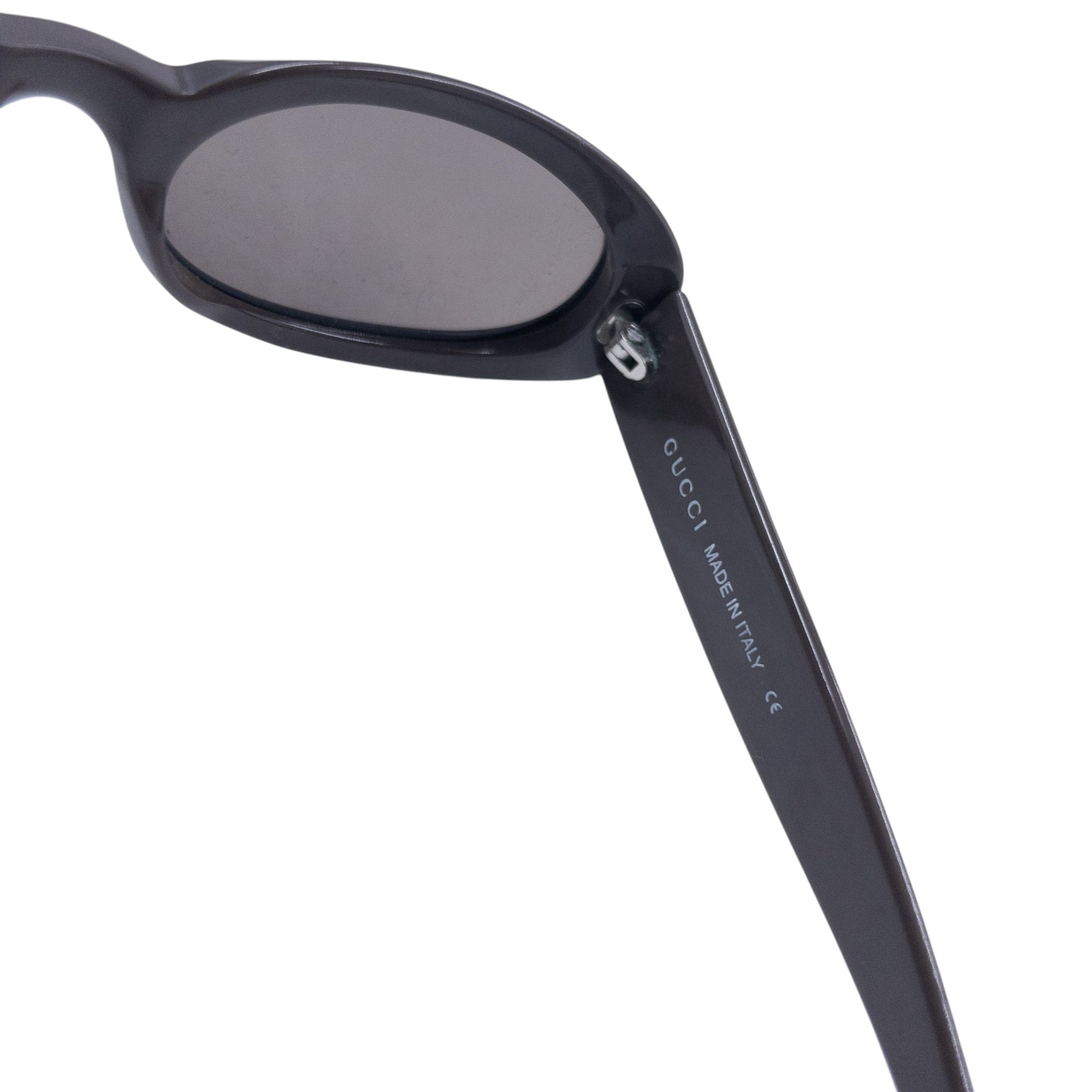 GUCCI sunglasses black thick plastic frame oval lenses model number on arms