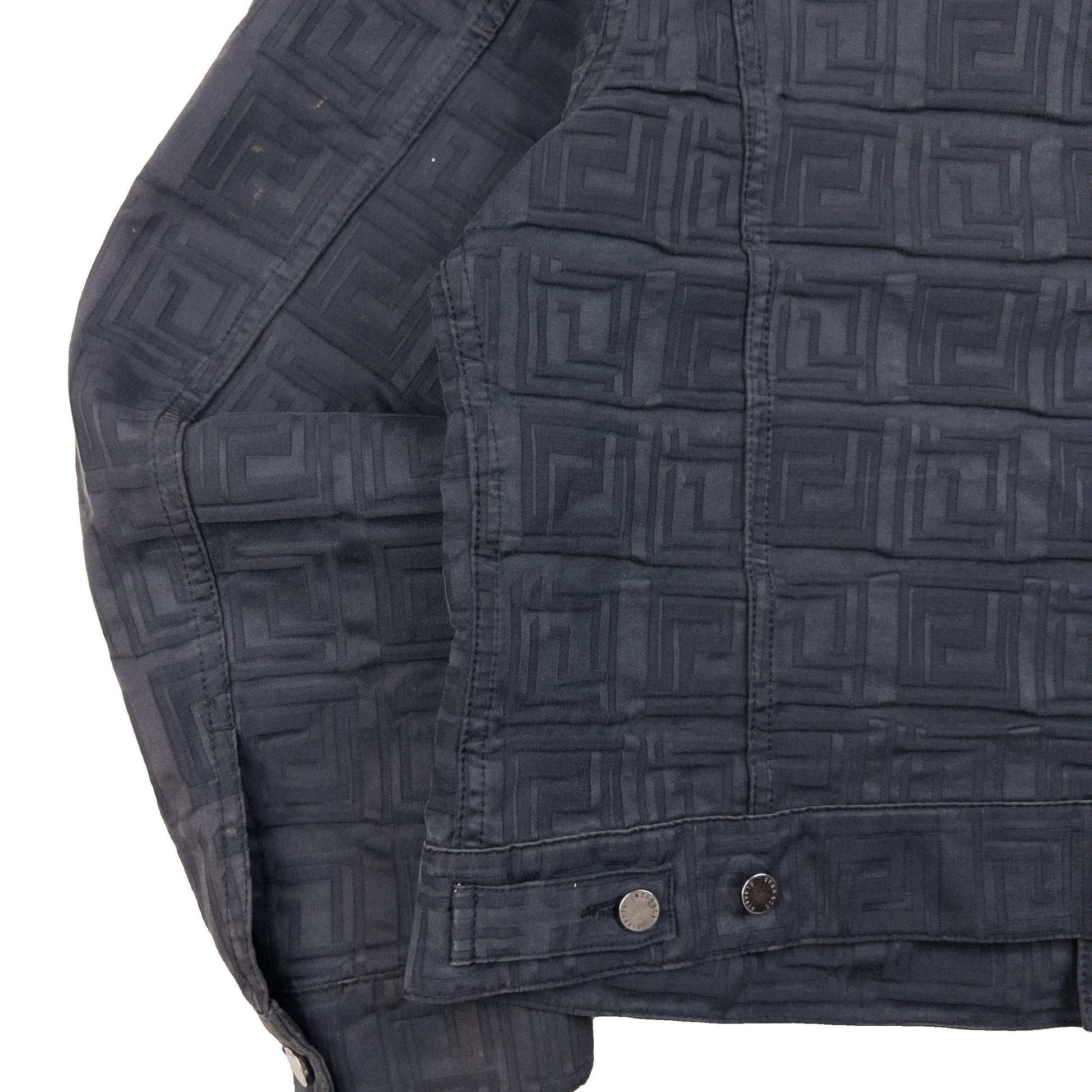 Versace Classic black button-up jacket embossed geometric pattern and branded metal buttons.