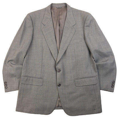 BALENCIAGA grey checkered suit set featuring a two-button jacket with flap pockets and pleated trousers