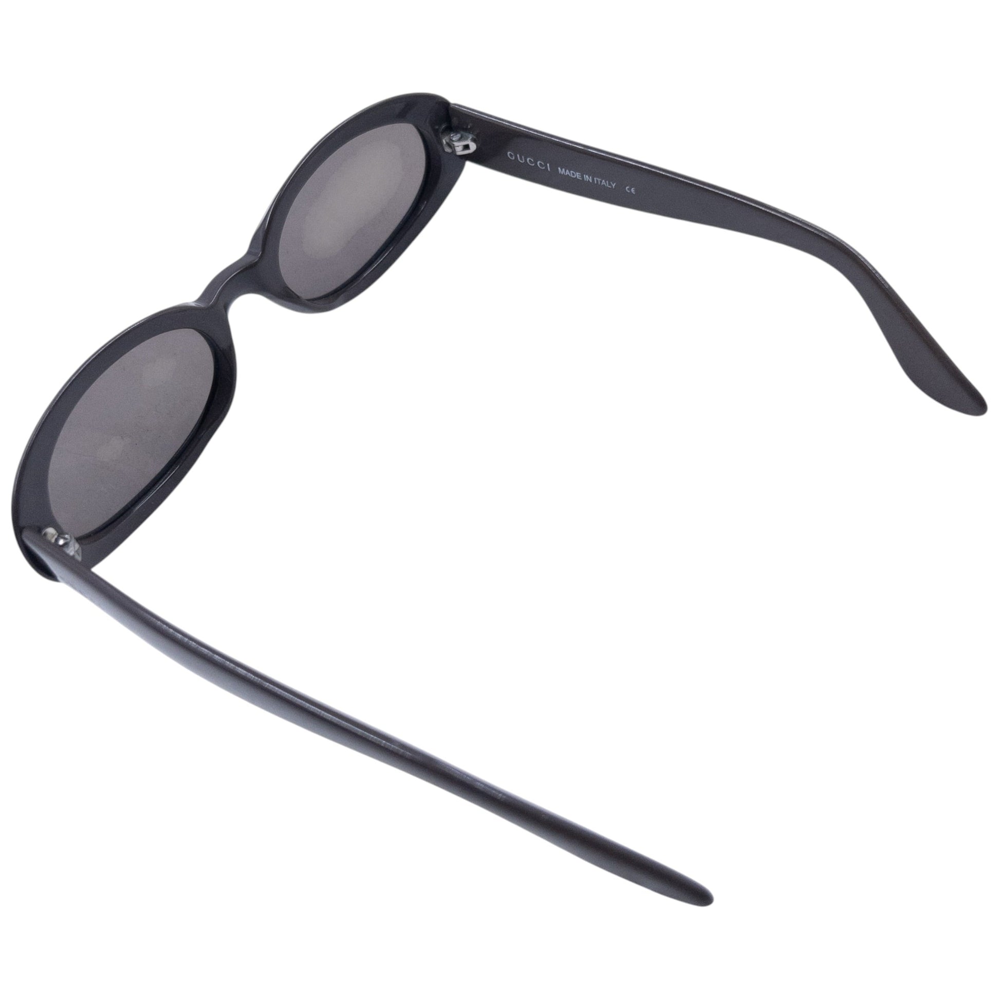 GUCCI sunglasses black thick plastic frame oval lenses model number on arms
