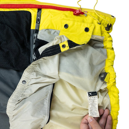 OAKLEY black and yellow zip-up snowboarding jacket bold patterned design on chest and sleeves