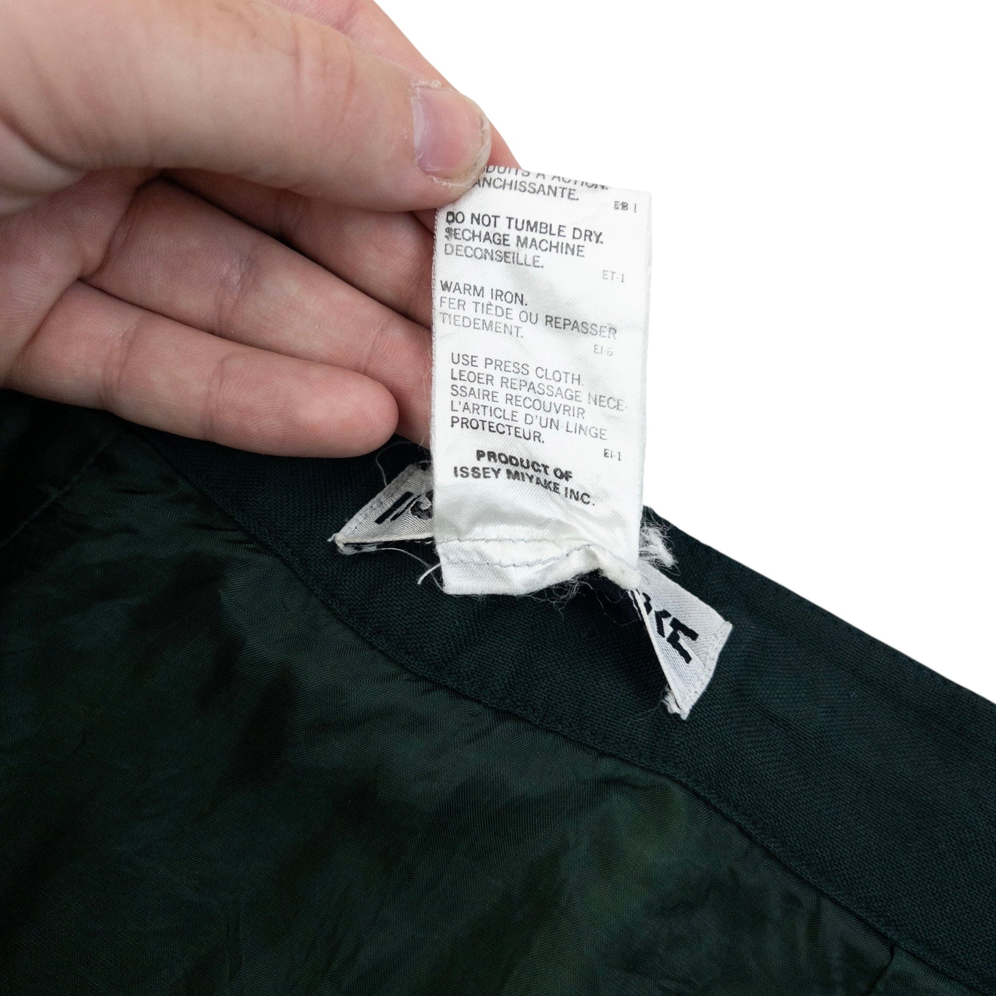 ISSEY MIYAKE vintage wrap skirt dark green wool fabric with button fastener at waistband