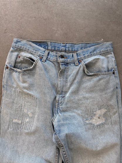 1990's Levi's 550 Orange Tab Repaired Jeans - 32 x 34 | W34, Multicoloured