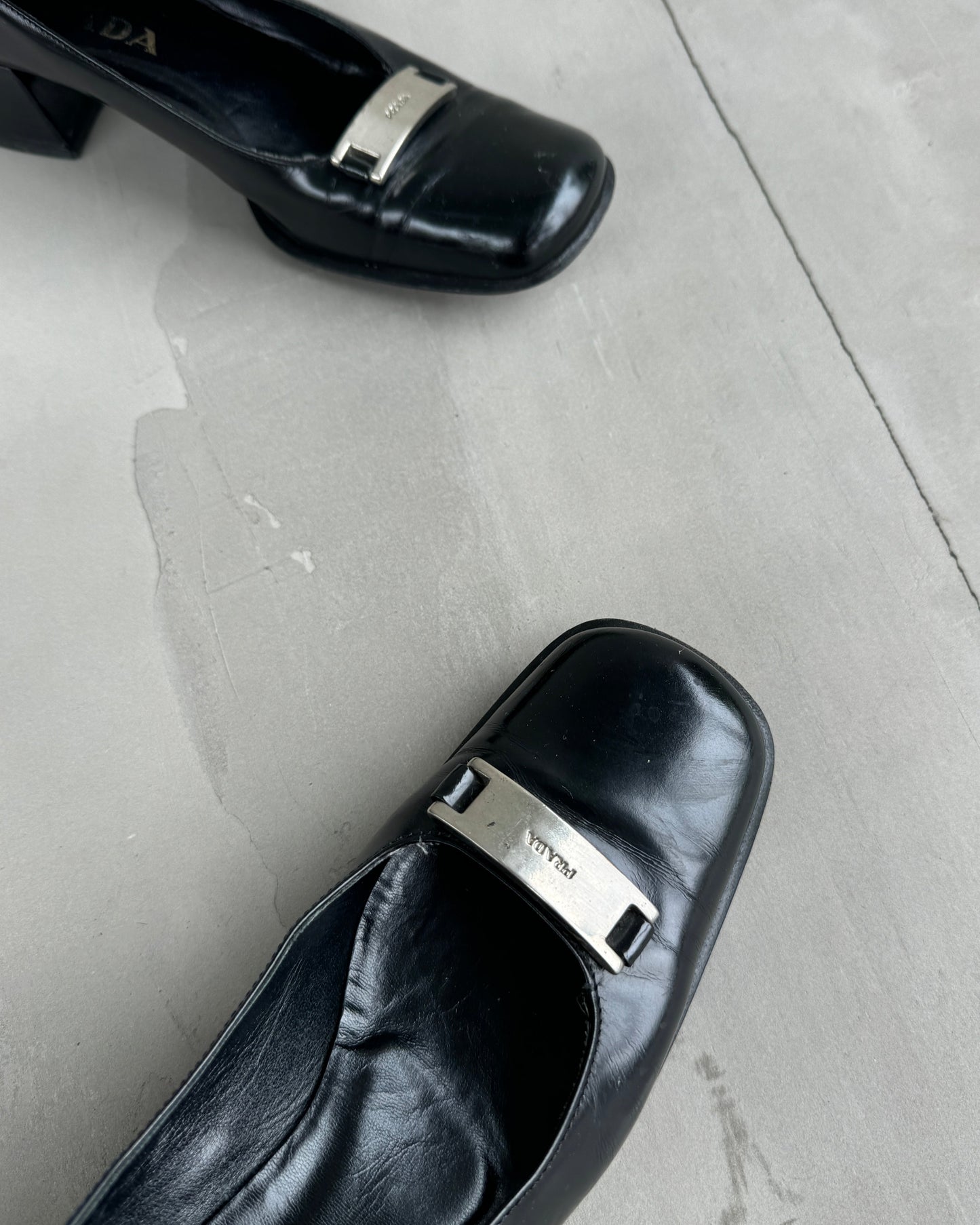 PRADA LEATHER HEELED LOAFER - EU 39.5 / UK 7