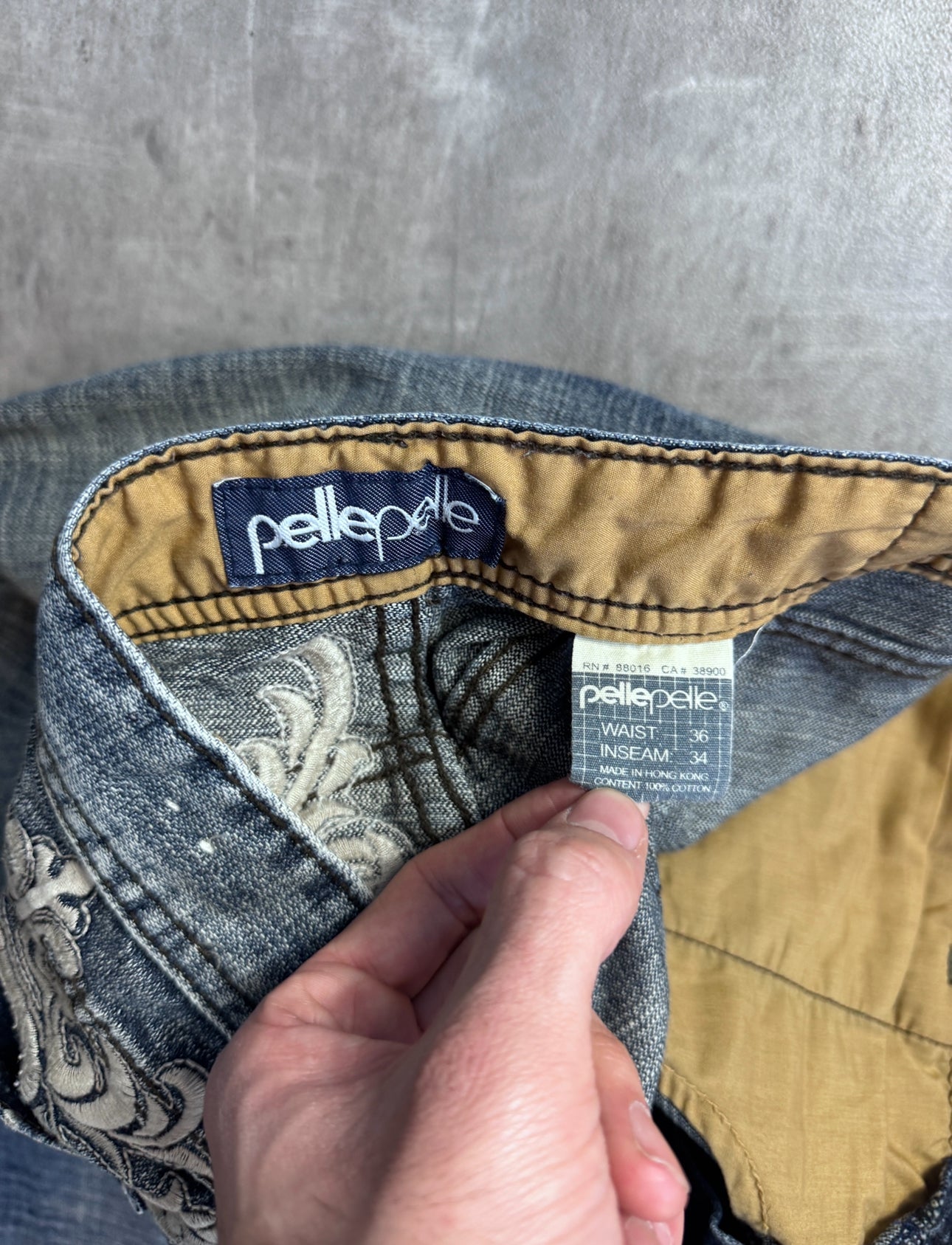 Pelle Pelle Embroidered Logo Crest Distressed Jeans