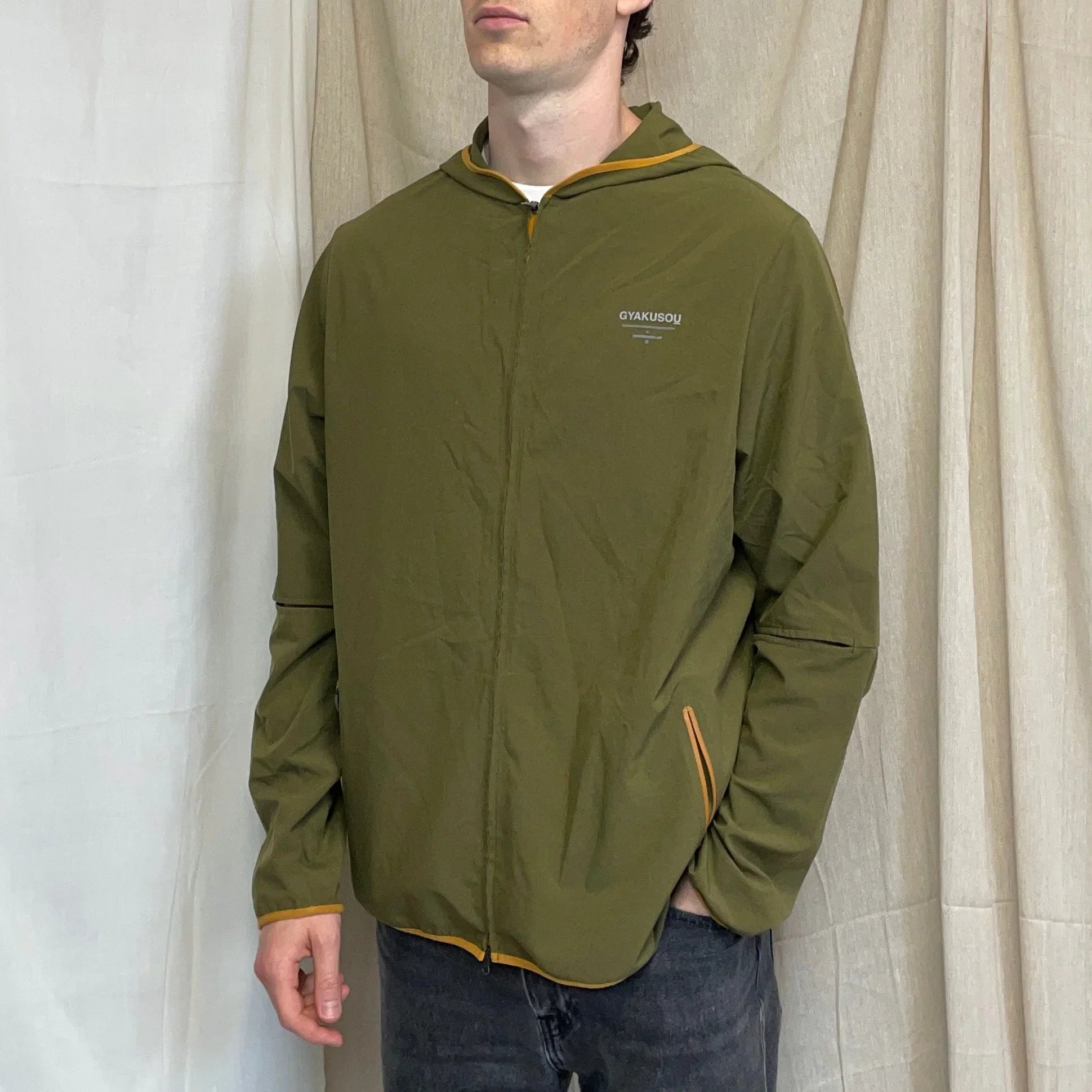 olive green windbreaker nike
