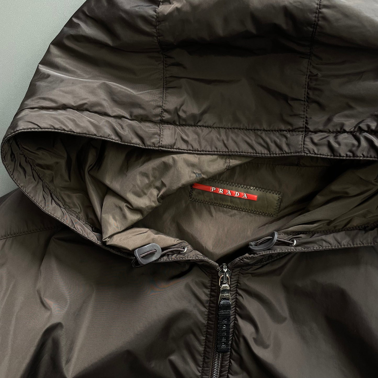 Prada Sport Brown 2007 Sleeve Spellout Nylon Hooded Windbreaker Jacket | X-Large, Brown