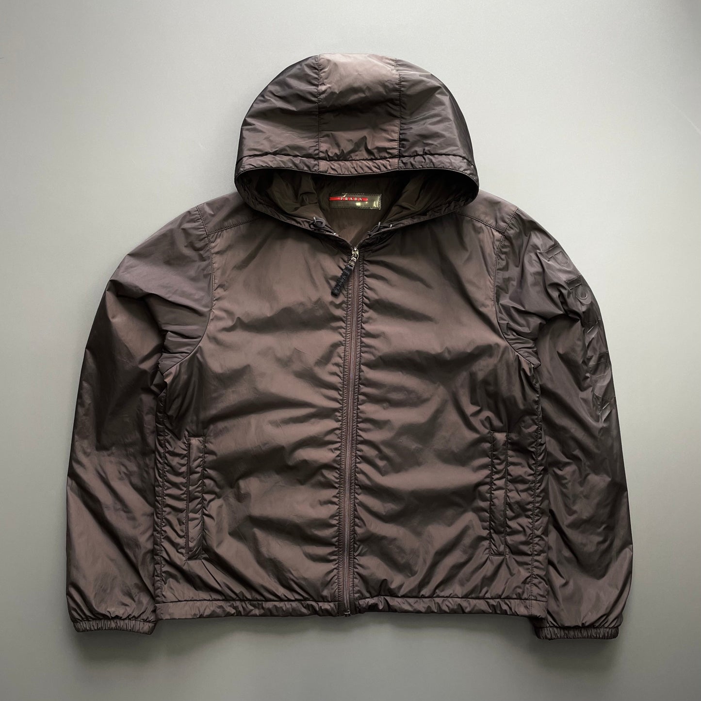 Prada Sport Brown 2007 Sleeve Spellout Nylon Hooded Windbreaker Jacket | X-Large, Brown