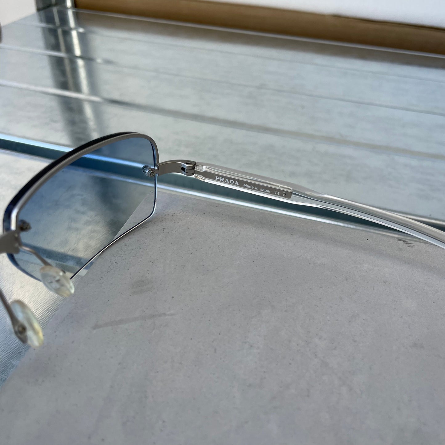 Prada Blue & Silver 00s Metal Frame Rimless Sunglasses | O/S, Blue